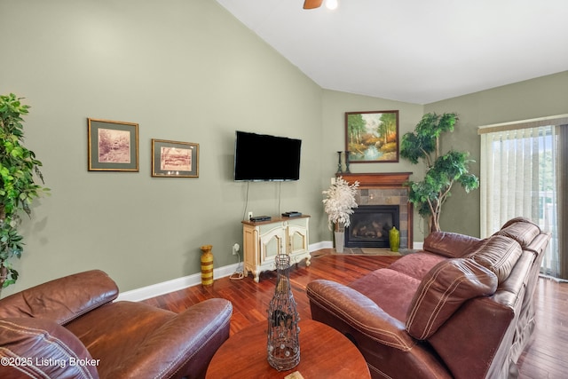 1126 Lagrange Rd, New Castle, KY 40050 - living room featuring vaulted ceiling, wood finished floors, and a tile fireplace