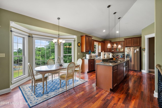 1126 Lagrange Rd, New Castle, KY 40050 - kitchen featuring stainless steel appliances, a chandelier, dark wood finished floors, a center island, and lofted ceiling