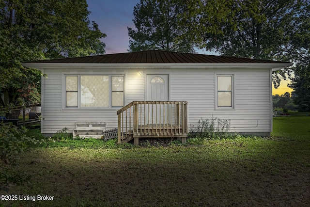 1255 Holy Cross Rd, Loretto, KY 40037 - bungalow-style house with a metal roof and a front lawn