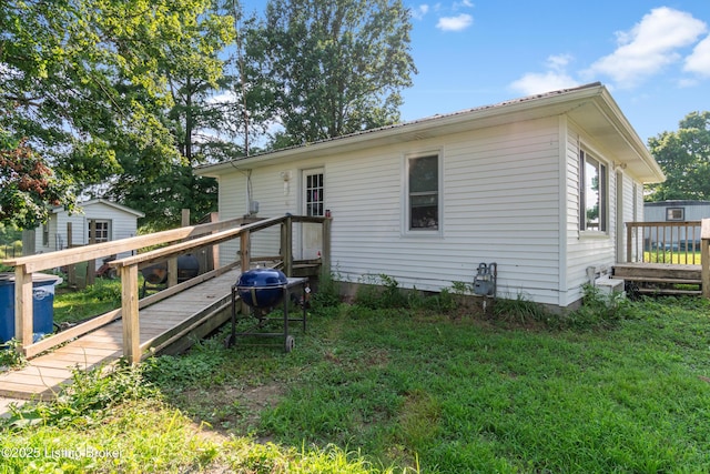 1255 Holy Cross Rd, Loretto, KY 40037 - rear view of house with a wooden deck and an outdoor structure