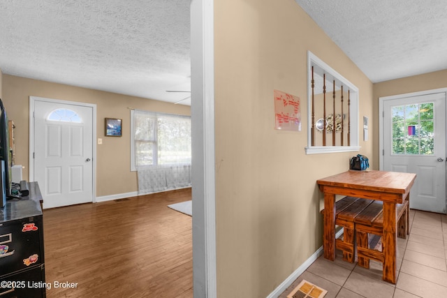 1255 Holy Cross Rd, Loretto, KY 40037 - foyer entrance with a textured ceiling, light wood-type flooring, and a ceiling fan