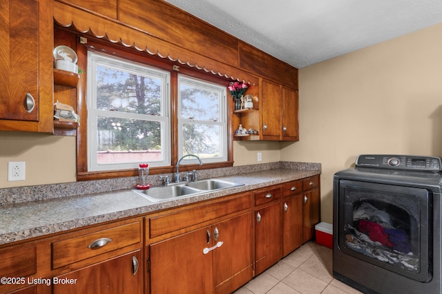 1255 Holy Cross Rd, Loretto, KY 40037 - washroom featuring washer / dryer, cabinet space, and light tile patterned floors