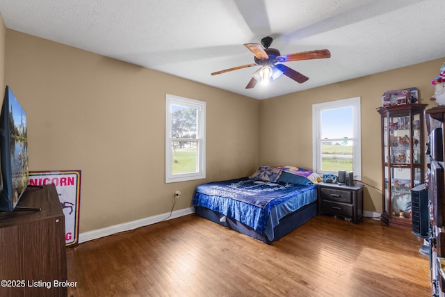 1255 Holy Cross Rd, Loretto, KY 40037 - bedroom featuring wood finished floors and ceiling fan