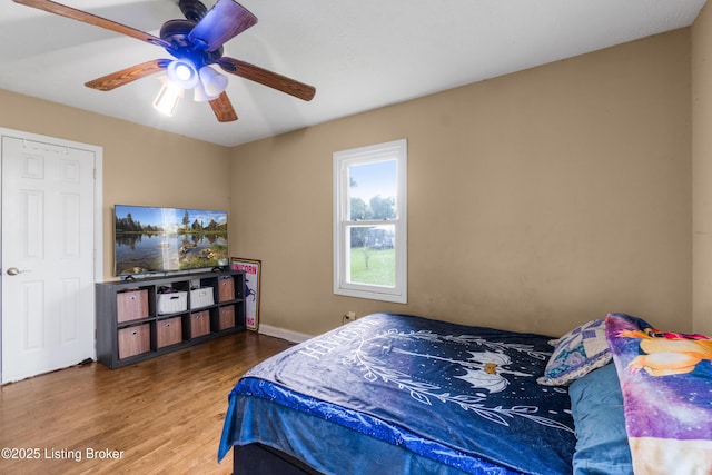 1255 Holy Cross Rd, Loretto, KY 40037 - bedroom featuring wood finished floors and ceiling fan