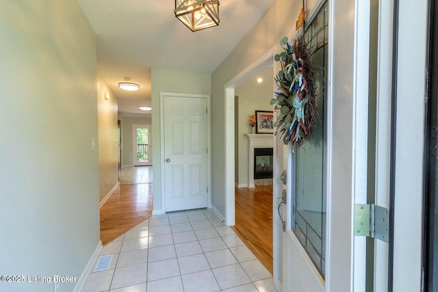 9829 Galene Dr, Jeffersontown, KY 40299 - corridor featuring light tile patterned floors and baseboards