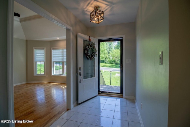 9829 Galene Dr, Jeffersontown, KY 40299 - entryway with healthy amount of natural light and light wood finished floors
