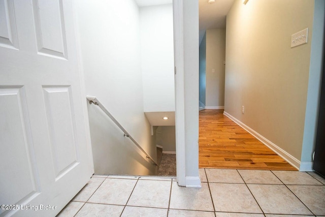 9829 Galene Dr, Jeffersontown, KY 40299 - hallway featuring an upstairs landing and tile patterned flooring