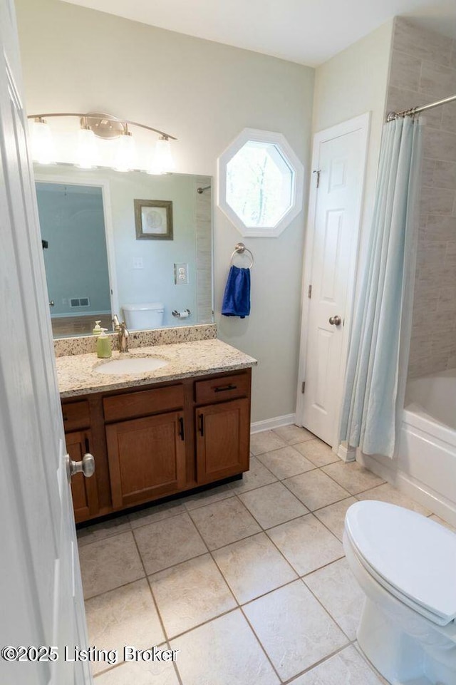 9829 Galene Dr, Jeffersontown, KY 40299 - full bathroom featuring vanity, tile patterned flooring, and shower / bath combo with shower curtain