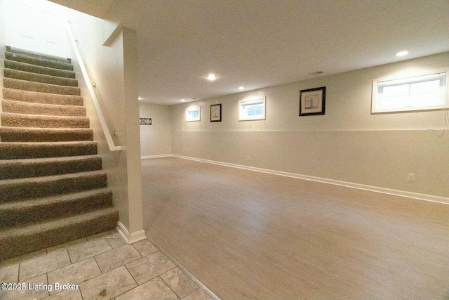 9829 Galene Dr, Jeffersontown, KY 40299 - below grade area featuring stairs, recessed lighting, and healthy amount of natural light