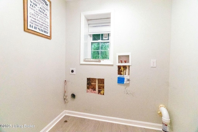 9829 Galene Dr, Jeffersontown, KY 40299 - laundry room with hookup for a washing machine, hookup for an electric dryer, gas dryer hookup, and wood finished floors