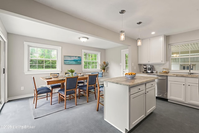 9715 Shady Acres Ln, Jeffersontown, KY 40299 - kitchen featuring stainless steel dishwasher, white cabinetry, a center island, hanging light fixtures, and recessed lighting