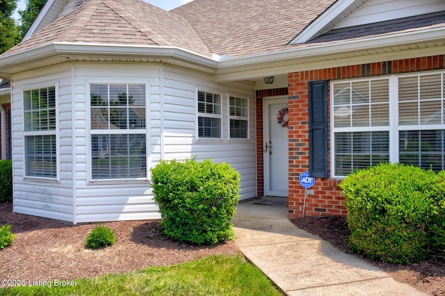 6813 Casey Pl, Louisville, KY 40229 - entrance to property with roof with shingles and brick siding