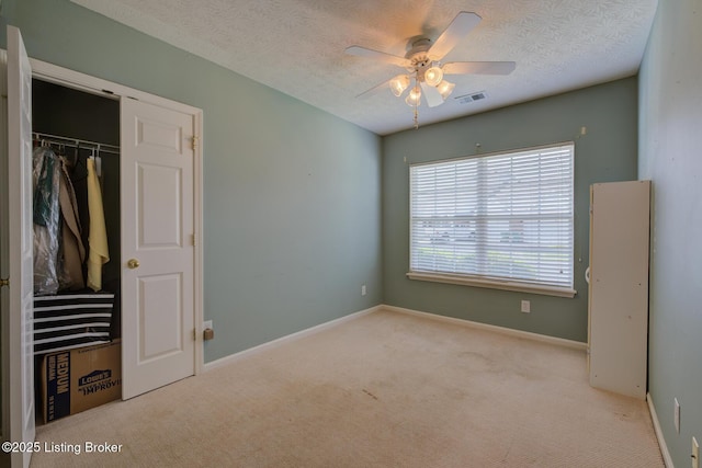 6813 Casey Pl, Louisville, KY 40229 - unfurnished bedroom with carpet floors, a closet, and ceiling fan