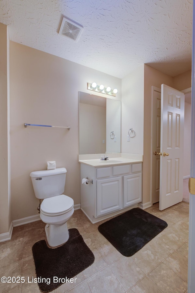 6813 Casey Pl, Louisville, KY 40229 - bathroom with vanity, a textured ceiling, and tile patterned flooring