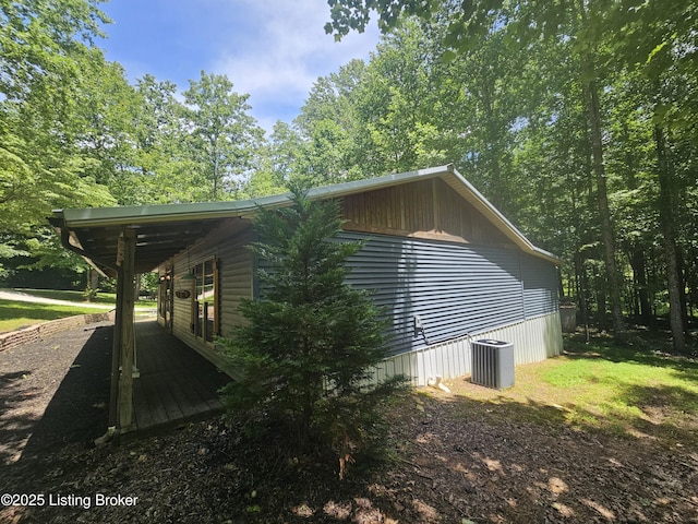 409 Woodhaven Ln, Leitchfield, KY 42754 - view of side of home with a central air condition unit