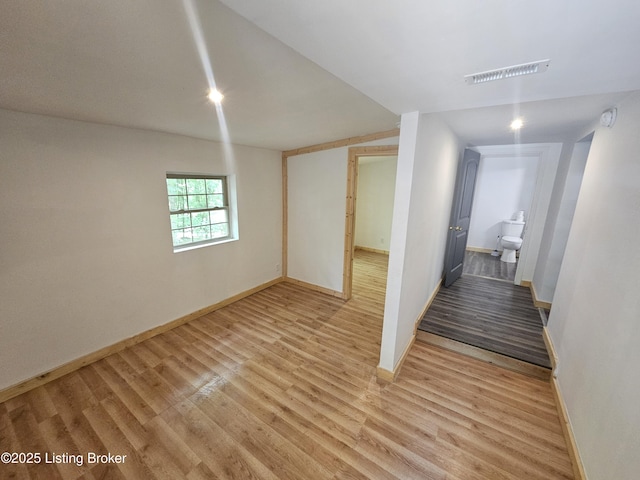 409 Woodhaven Ln, Leitchfield, KY 42754 - below grade area with light wood-type flooring and baseboards