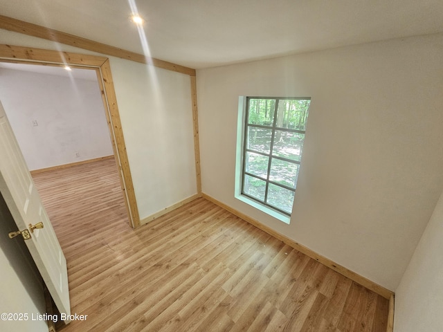 409 Woodhaven Ln, Leitchfield, KY 42754 - spare room featuring light wood finished floors and baseboards