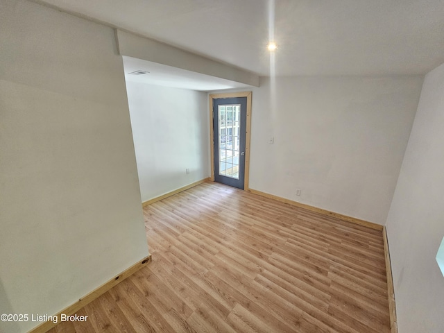 409 Woodhaven Ln, Leitchfield, KY 42754 - spare room with light wood-style floors and baseboards