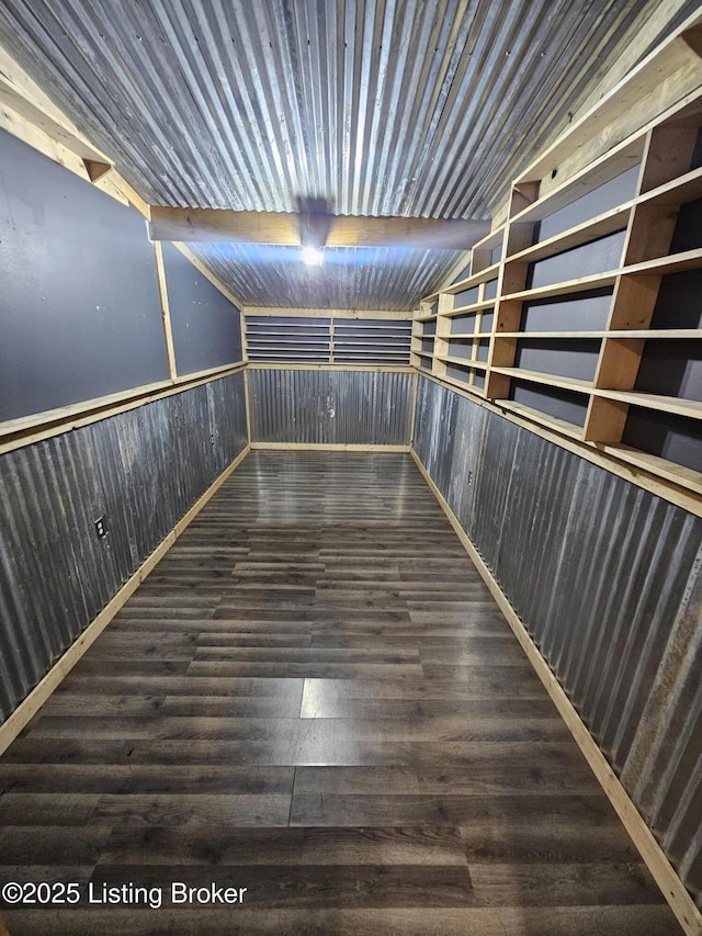 409 Woodhaven Ln, Leitchfield, KY 42754 - empty room with wooden walls, wood finished floors, and wainscoting