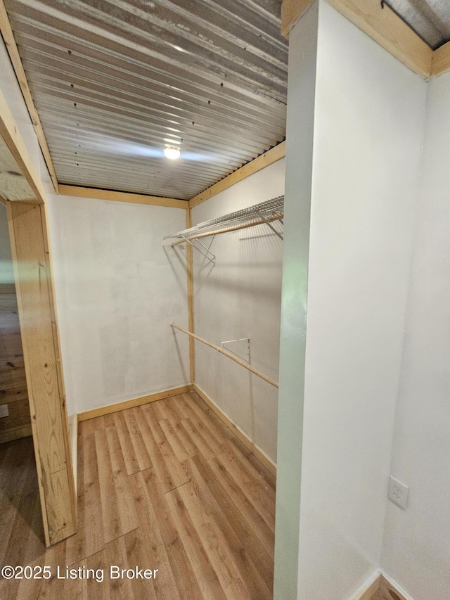 409 Woodhaven Ln, Leitchfield, KY 42754 - walk in closet with wood finished floors