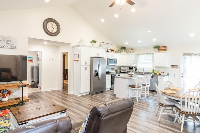 414 Turnberry Ct, Vine Grove, KY 40175 - living room with a ceiling fan, high vaulted ceiling, light wood finished floors, and recessed lighting