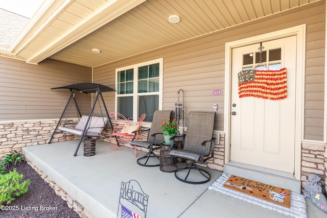 414 Turnberry Ct, Vine Grove, KY 40175 - entrance to property featuring stone siding and a porch