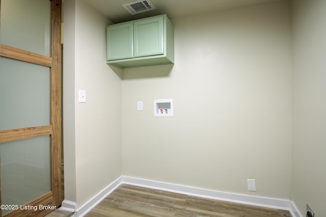 80 Kavanaugh St, Shelbyville, KY 40065 - washroom with hookup for a washing machine, wood finished floors, and cabinet space
