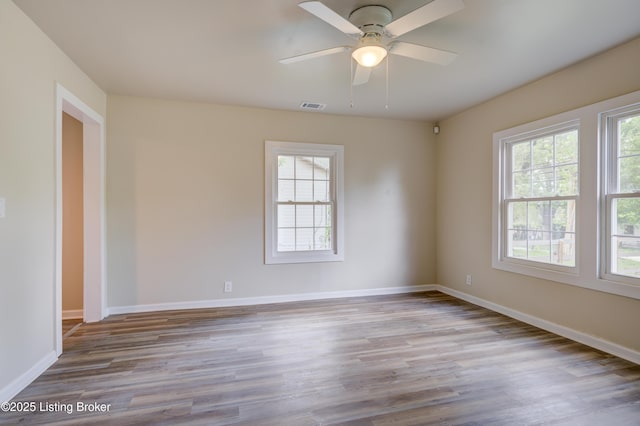 80 Kavanaugh St, Shelbyville, KY 40065 - spare room with healthy amount of natural light, wood finished floors, and a ceiling fan