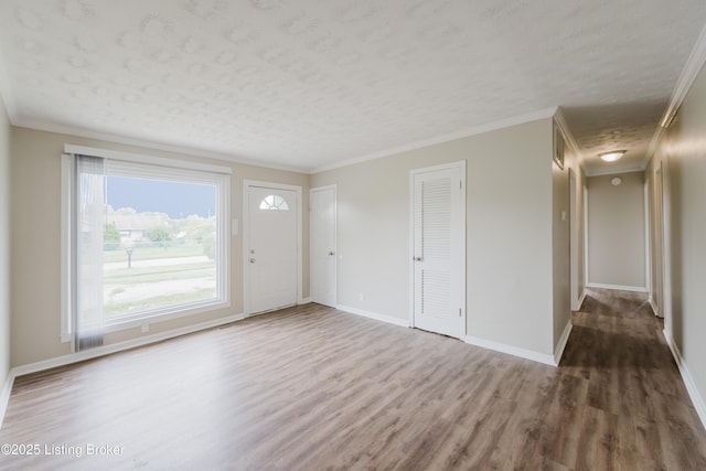 5105 Kilmer Blvd, Louisville, KY 40213 - entrance foyer featuring wood finished floors, a textured ceiling, and ornamental molding