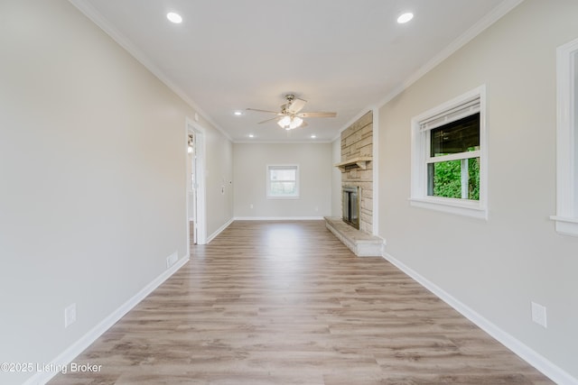 5105 Kilmer Blvd, Louisville, KY 40213 - unfurnished living room with a ceiling fan, a fireplace, ornamental molding, recessed lighting, and light wood-style floors