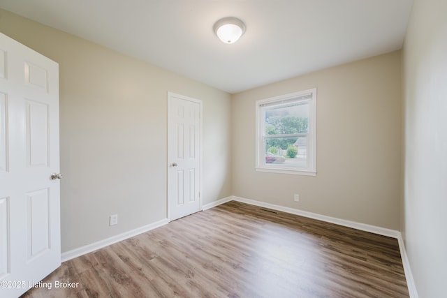 5105 Kilmer Blvd, Louisville, KY 40213 - unfurnished bedroom featuring wood finished floors and a closet