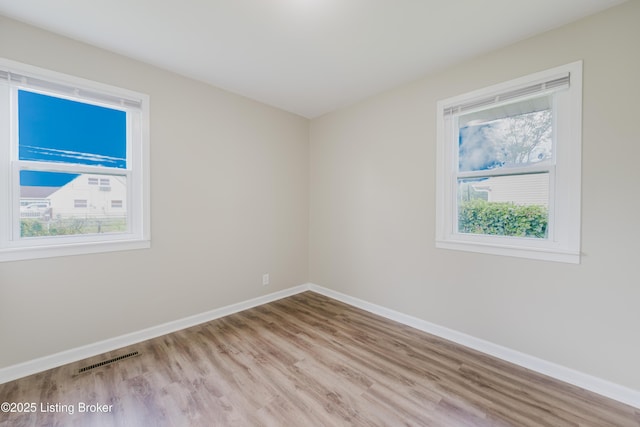 5105 Kilmer Blvd, Louisville, KY 40213 - spare room with wood finished floors and plenty of natural light