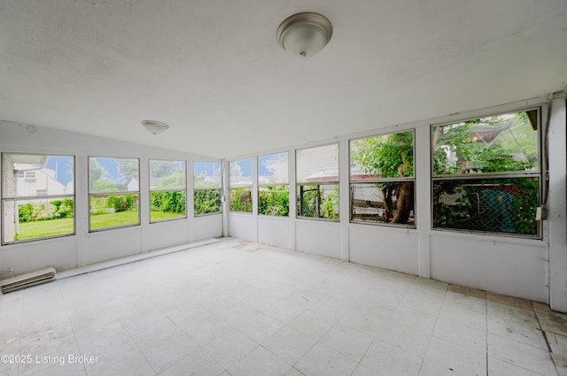 5105 Kilmer Blvd, Louisville, KY 40213 - unfurnished sunroom featuring healthy amount of natural light, vaulted ceiling, and a baseboard heating unit