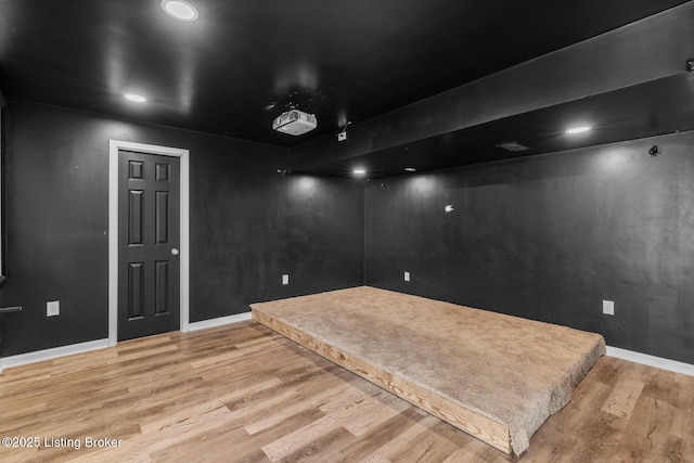 9006 Big Boulder Dr, Louisville, KY 40291 - home theater room featuring light wood-style flooring and recessed lighting
