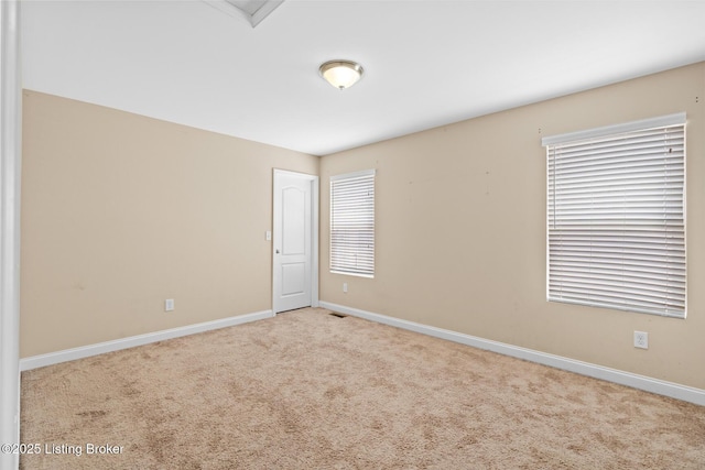 9006 Big Boulder Dr, Louisville, KY 40291 - unfurnished room with baseboards and carpet