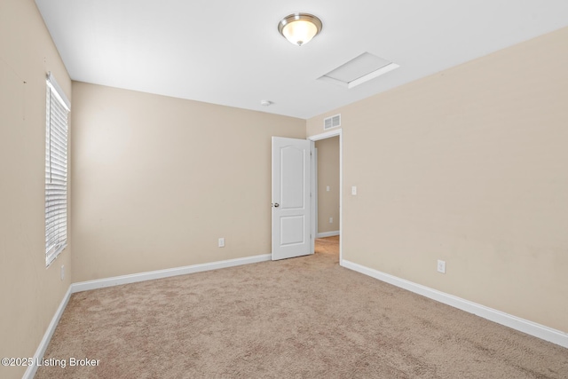 9006 Big Boulder Dr, Louisville, KY 40291 - spare room with attic access and carpet flooring