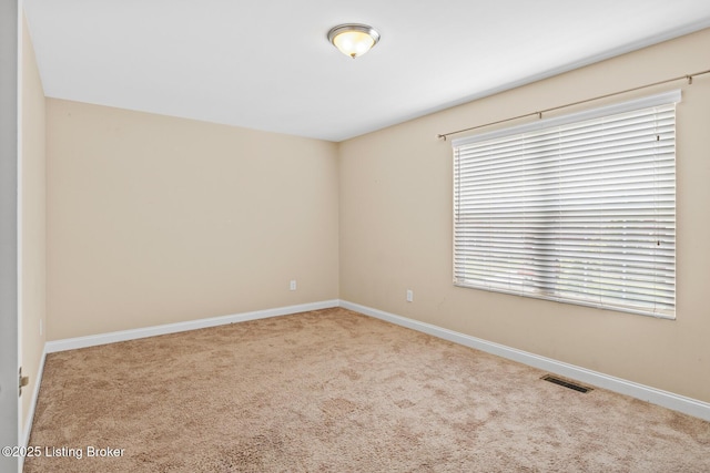 9006 Big Boulder Dr, Louisville, KY 40291 - carpeted spare room with baseboards