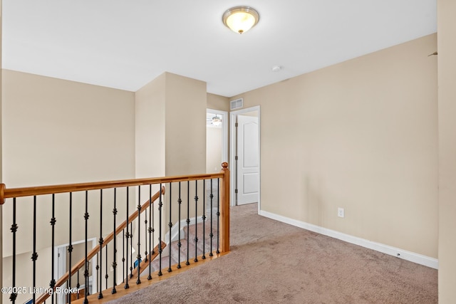 9006 Big Boulder Dr, Louisville, KY 40291 - hall with carpet flooring and an upstairs landing