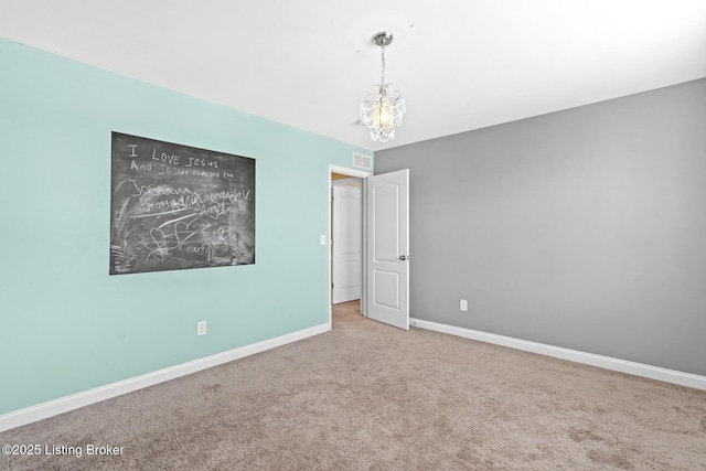 9006 Big Boulder Dr, Louisville, KY 40291 - empty room featuring a chandelier and carpet flooring