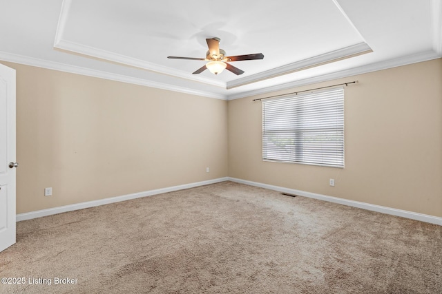 9006 Big Boulder Dr, Louisville, KY 40291 - empty room with a raised ceiling, a ceiling fan, ornamental molding, and carpet