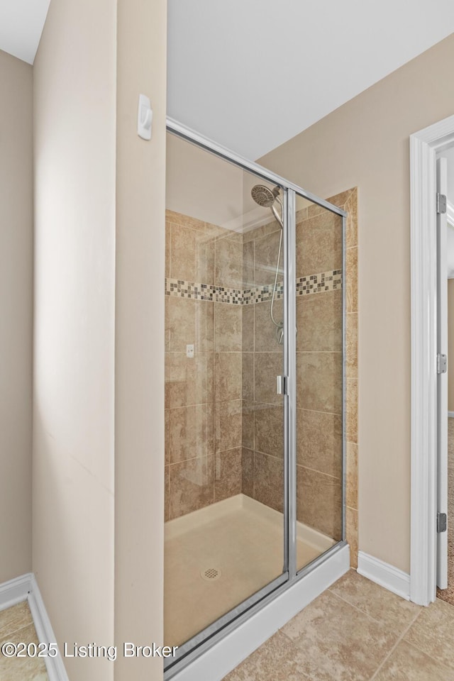 9006 Big Boulder Dr, Louisville, KY 40291 - full bathroom featuring a stall shower and tile patterned flooring