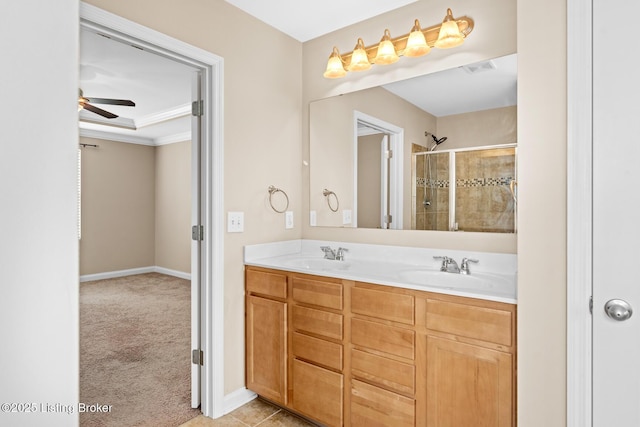 9006 Big Boulder Dr, Louisville, KY 40291 - bathroom with ceiling fan, double vanity, tiled shower, and crown molding