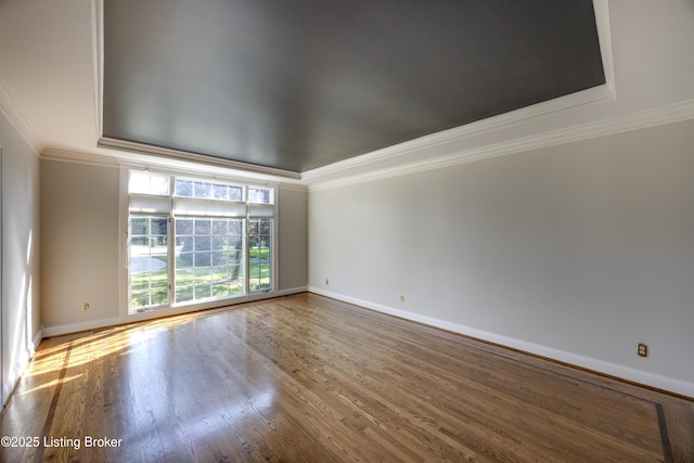 7202 Doe Crest Ct, Prospect, KY 40059 - unfurnished room with crown molding, wood finished floors, and a raised ceiling
