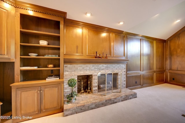 7202 Doe Crest Ct, Prospect, KY 40059 - unfurnished living room with carpet, a brick fireplace, a decorative wall, and built in features