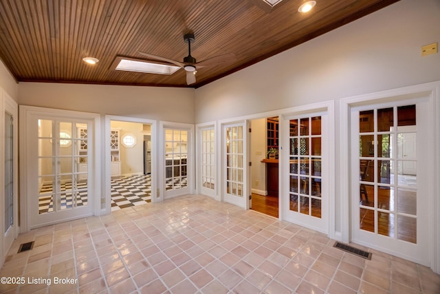 7202 Doe Crest Ct, Prospect, KY 40059 - unfurnished sunroom with vaulted ceiling and a skylight