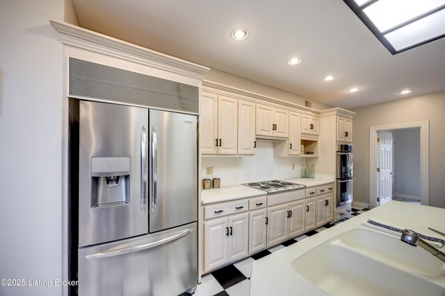 7202 Doe Crest Ct, Prospect, KY 40059 - kitchen with stainless steel appliances, light countertops, recessed lighting, and white cabinetry