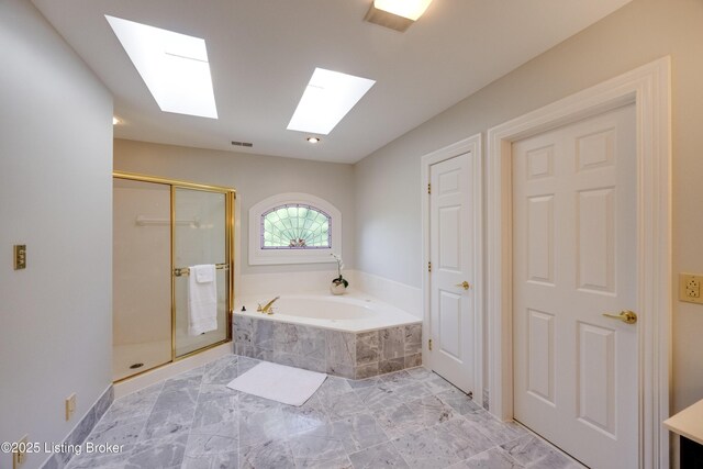 7202 Doe Crest Ct, Prospect, KY 40059 - full bathroom with a skylight, a garden tub, a stall shower, and marble finish floors