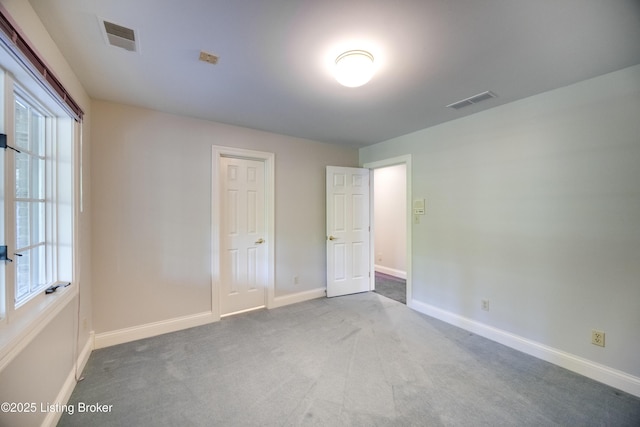 7202 Doe Crest Ct, Prospect, KY 40059 - unfurnished bedroom featuring carpet and multiple windows