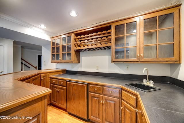7202 Doe Crest Ct, Prospect, KY 40059 - kitchen with ornamental molding, brown cabinetry, glass insert cabinets, recessed lighting, and dark countertops