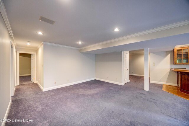 7202 Doe Crest Ct, Prospect, KY 40059 - finished below grade area featuring ornamental molding, dark carpet, and recessed lighting